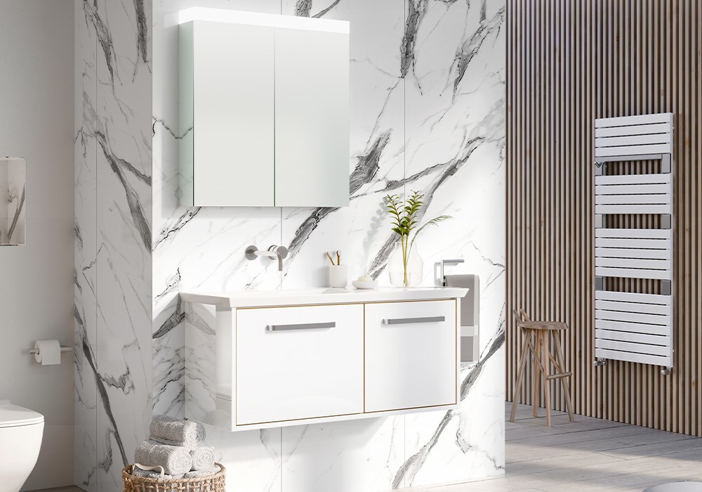 Modern White Bathroom | For a luxury white bathroom, consider introducing white basin mixers to perfectly complement white basins and furniture for a relaxing look.